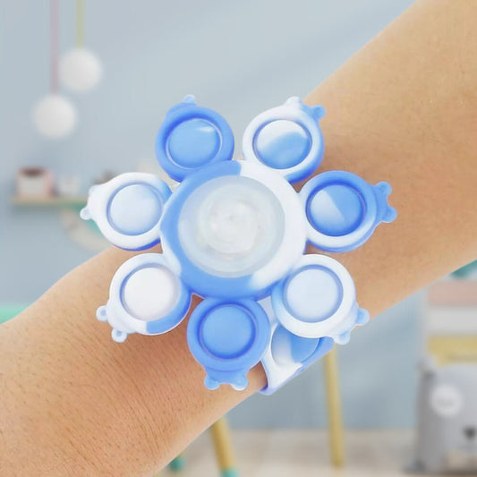 Spinning Pop Bubble Bracelet. Shop Spinning Tops on Mounteen. Worldwide shipping available.