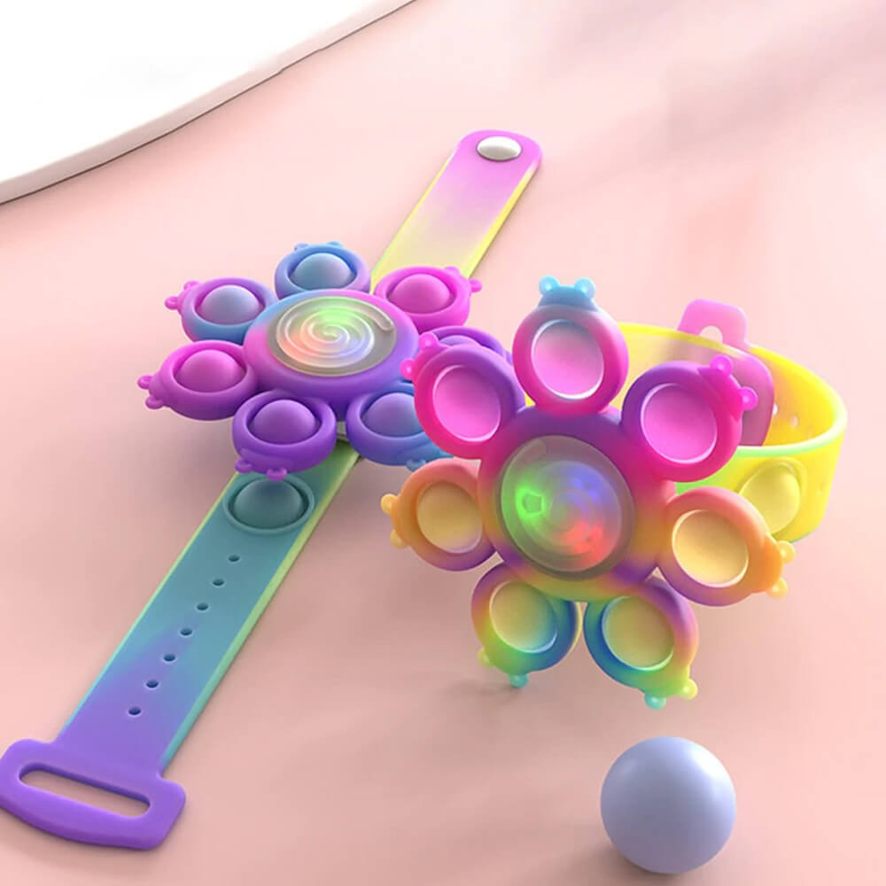 Spinning Pop Bubble Bracelet. Shop Spinning Tops on Mounteen. Worldwide shipping available.